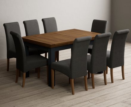 Extending buxton 140cm oak and dark blue dining table with 8 charcoal grey scroll back chairs