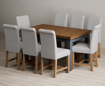 Extending buxton 140cm oak and dark blue dining table with 8 grey braced chairs