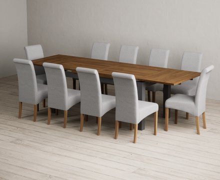 Extending buxton 180cm oak and charcoal grey dining table with 10 grey scroll back chairs