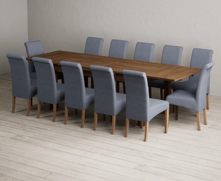 Extending buxton 180cm rustic solid oak dining table with 12 blue scroll back chairs