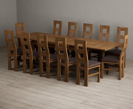 Extending buxton 180cm rustic solid oak dining table with 12 brown rustic solid oak chairs