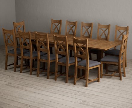Extending buxton 180cm rustic solid oak dining table with 12 charcoal grey rustic solid oak chairs
