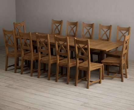 Extending buxton 180cm rustic solid oak dining table with 12 rustic oak rustic solid oak chairs