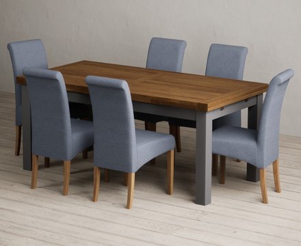 Extending buxton 180cm oak and charcoal grey dining table with 6 blue scroll back chairs