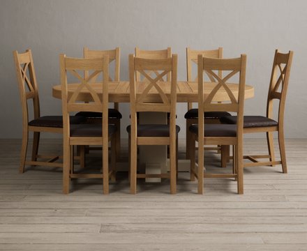 Extending helmsley oak and cream painted pedestal dining table with 8 brown natural solid oak chairs