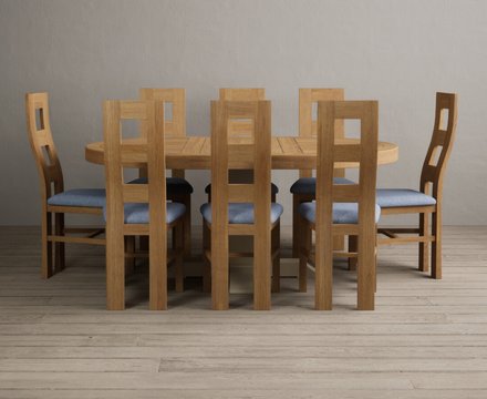 Extending helmsley oak and cream painted pedestal dining table with 8 blue natural chairs