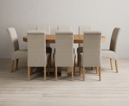 Extending helmsley oak and cream painted pedestal dining table with 8 natural scroll back chairs