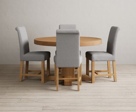 Extending helmsley solid oak pedestal dining table with 4 grey braced chairs