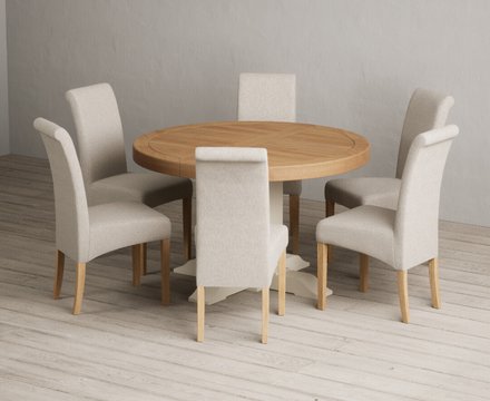 Extending helmsley oak and cream painted pedestal dining table with 6 natural scroll back chairs
