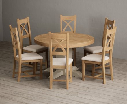 Extending helmsley oak and cream painted pedestal dining table with 6 linen natural solid oak chairs