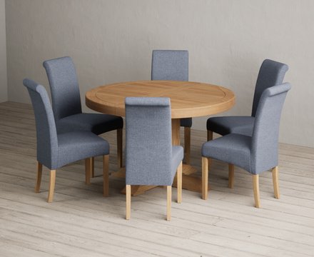 Extending helmsley solid oak pedestal dining table with 6 blue scroll back chairs
