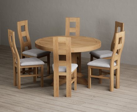 Extending helmsley solid oak pedestal dining table with 6 light grey natural chairs