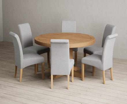 Extending helmsley solid oak pedestal dining table with 6 grey scroll back chairs