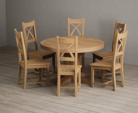 Extending helmsley solid oak pedestal dining table with 6 oak natural chairs