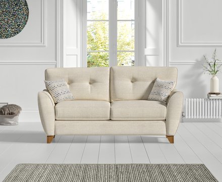 Florin cream fabric two seater sofa