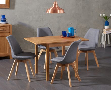 Extending york 70cm solid oak dining table with 4 dark grey orson chairs
