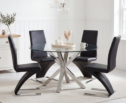 Rodin round glass dining table with 4 black aldo chairs