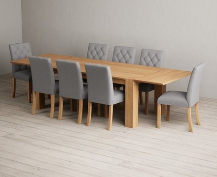 Extending sheringham 200cm solid oak dining table with 8 grey isabella chairs