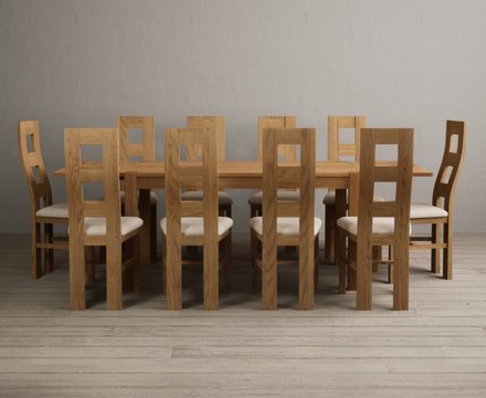 Extending thetford 150cm solid oak dining table with 10 linen natural chairs