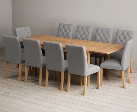 Extending thetford 150cm solid oak table with 10 grey isabella chairs