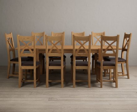 Extending thetford 150cm solid oak dining table with 10 brown natural solid oak chairs