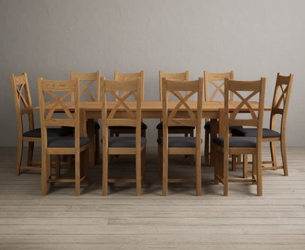 Extending thetford 150cm solid oak dining table with 10 charcoal grey natural solid oak chairs
