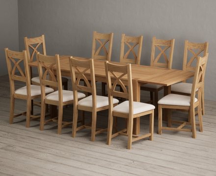 Extending thetford 150cm solid oak dining table with 10 linen natural solid oak chairs