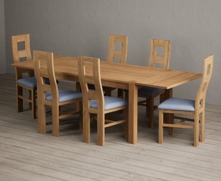 Extending thetford 150cm solid oak dining table with 6 blue natural chairs