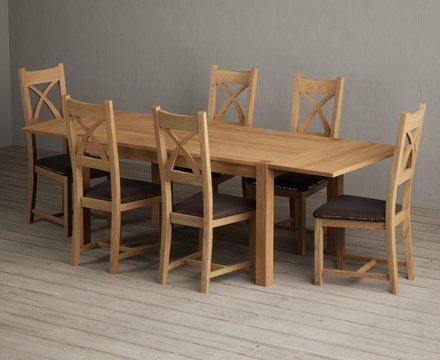 Extending thetford 150cm solid oak dining table with 6 brown natural solid oak chairs