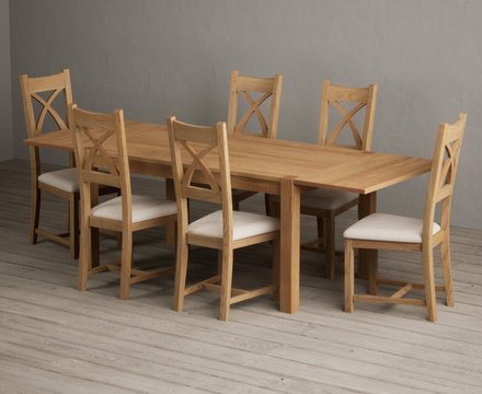 Extending thetford 150cm solid oak dining table with 6 linen natural solid oak chairs