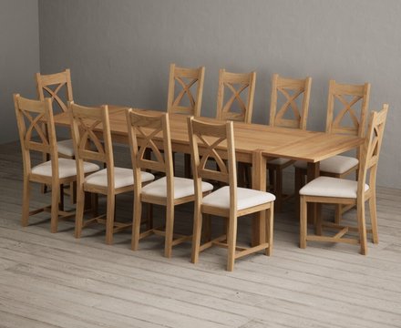 Extending thetford 180cm solid oak dining table with 10 linen natural solid oak chairs
