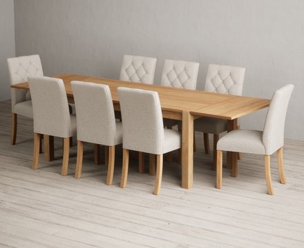 Extending thetford 180cm solid oak dining table with 8 natural isabella chairs