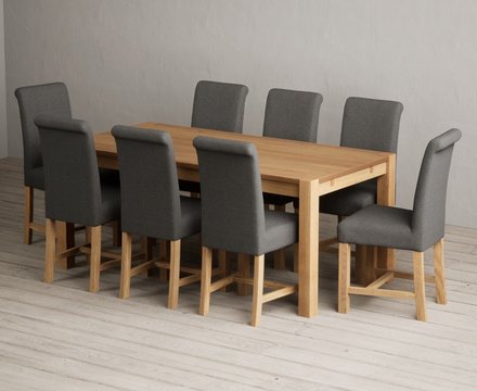 Thetford 180cm solid oak dining table with 8 charcoal grey braced chairs
