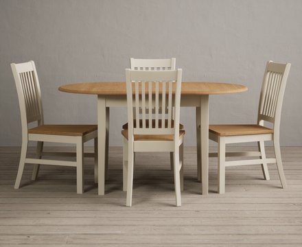 Extending warwick oak and cream painted dining table with 4 oak warwick chairs