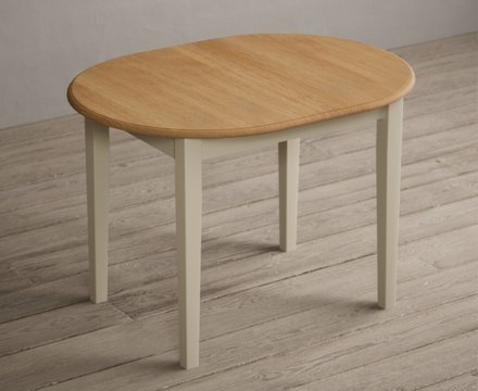 Extending warwick oak and cream painted dining table