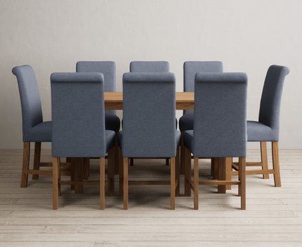 York 120cm solid oak dining table with 8 blue braced chairs