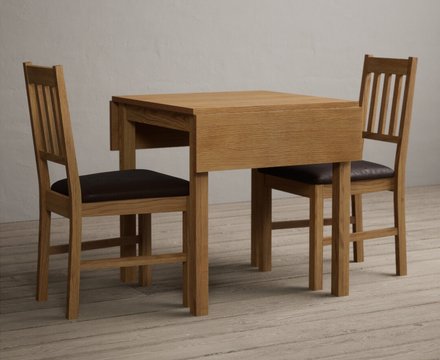Extending york 70cm solid oak dining table with 4 brown york chairs