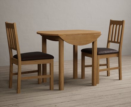 Extending york 90cm solid oak dining table with 2 brown york chairs