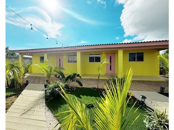 Wake Up To Tropical Scents In A Cozy Colorful Garden Cottage
