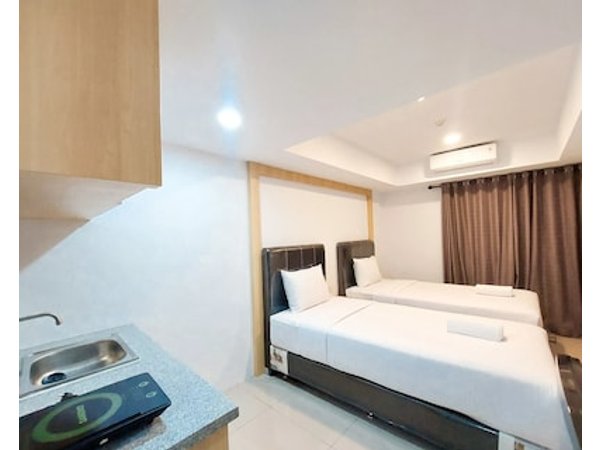 Homey And Comfortable Studio At De Prima Apartment