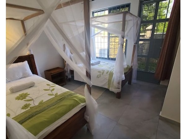 Beachfront cosy 2-bedroom Hibiscus Cottage