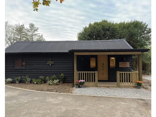 A charming cottage nestled in a peaceful woodland