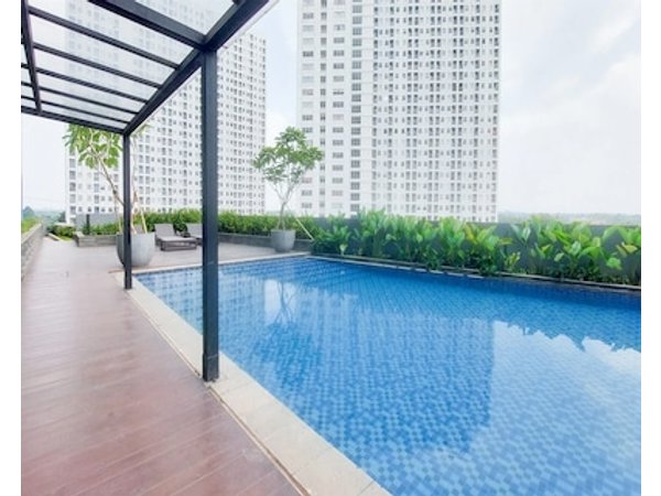 Minimalist And Warm Studio Room At Cisauk Point Apartment