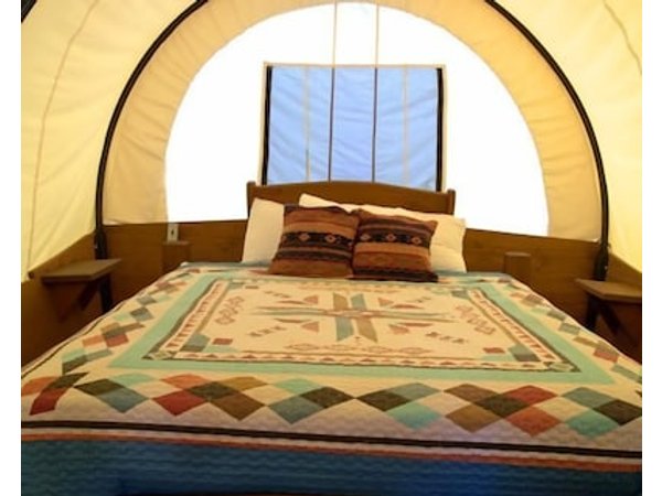 Unforgettable Glamping Getaways in this Covered Wagon in Moore Oklahoma
