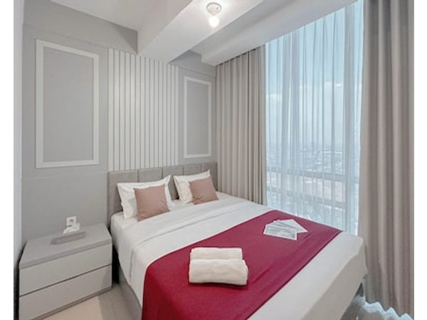 Combined Grey Toned 2Br Apartment At The City Square Surabaya