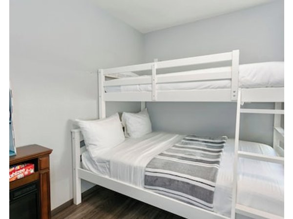 Studio Cottage With Cozy Queen Bed And One Sofa Bed Eclectic Little Bathroom.