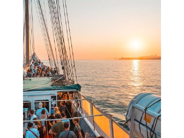 Lisbon Boat Party with Music, Drinks, and Stunning Views.
