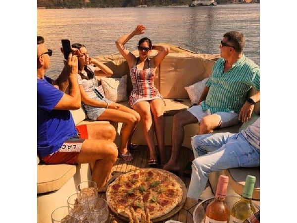 Lisbon Sunset Cozy Boat Cruise with Open Bar & Pizza