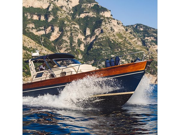 Sorrento to Capri Private Boat Experience on a Gozzo Apreamare 10