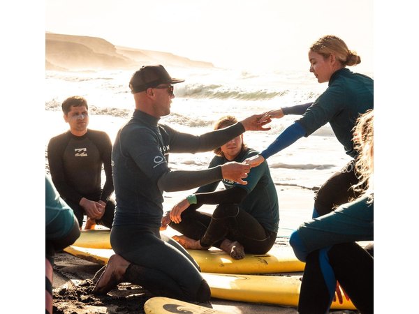 Learn to surf on the endless beaches in southern Fuerteventura